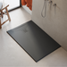 Receveur de douche extra plat 3 cm HALDOR LAVABERG Noir RAL 9005 — installé dans une salle de bain moderne